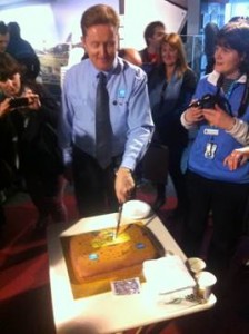 Glen Nagle cuts the mission cake Glen Nagle cuts the mission cake